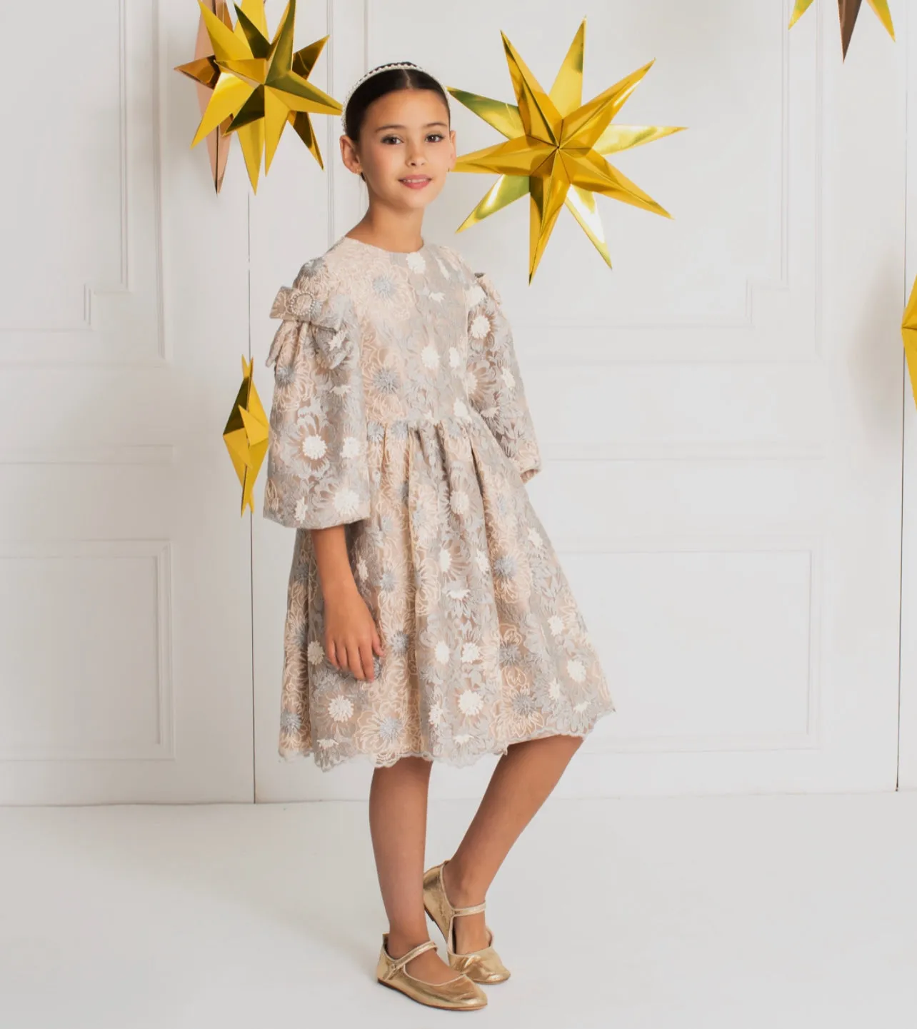 Beautiful Satin dress with delicate embroidered tulle details.